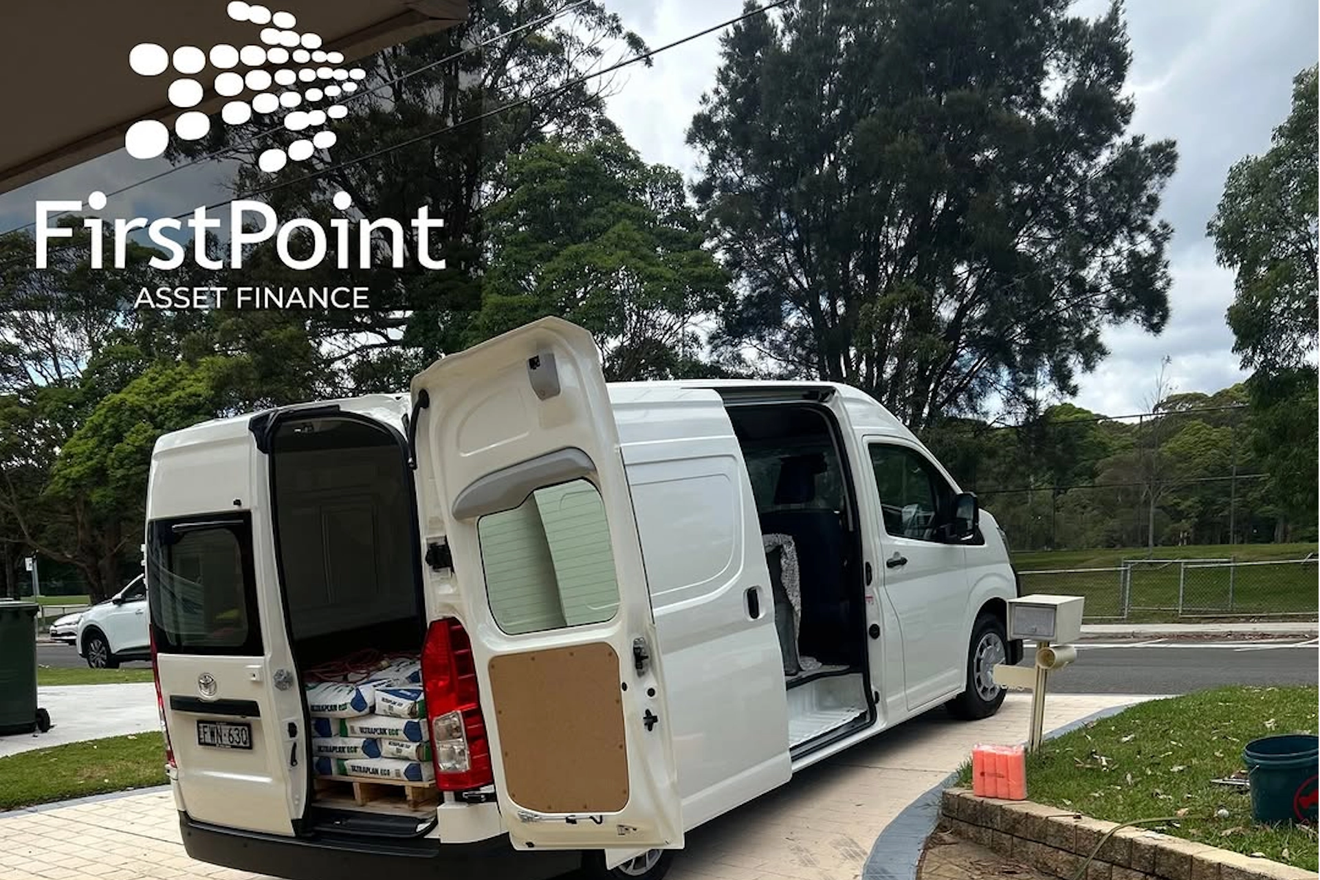 White Toyota van with open doors, showcasing asset finance options in Australia.