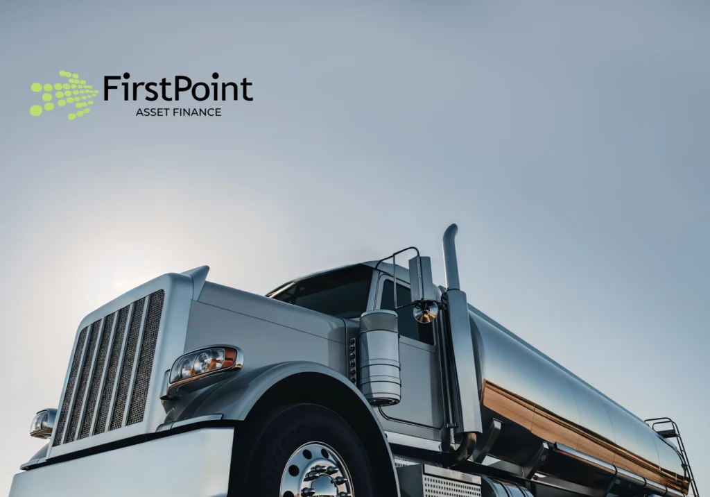 Shiny semi-trailer truck against a blue sky, representing asset finance solutions for businesses in Australia.