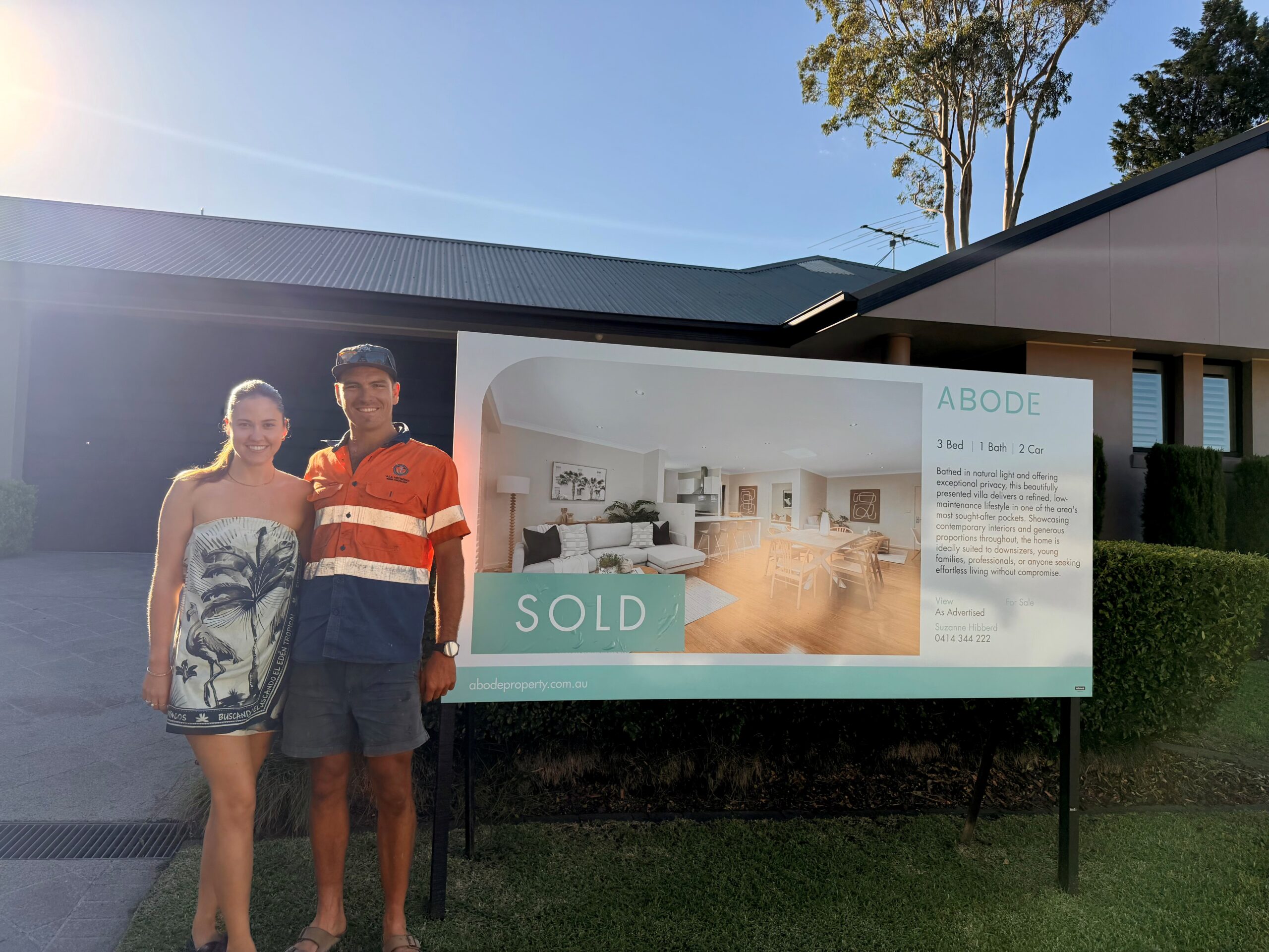 Happy couple celebrating a sold home loan in Cronulla, Sutherland Shire.